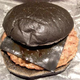 Illustration for article titled Burger King's all-black burger looks absolutely disgusting in real life